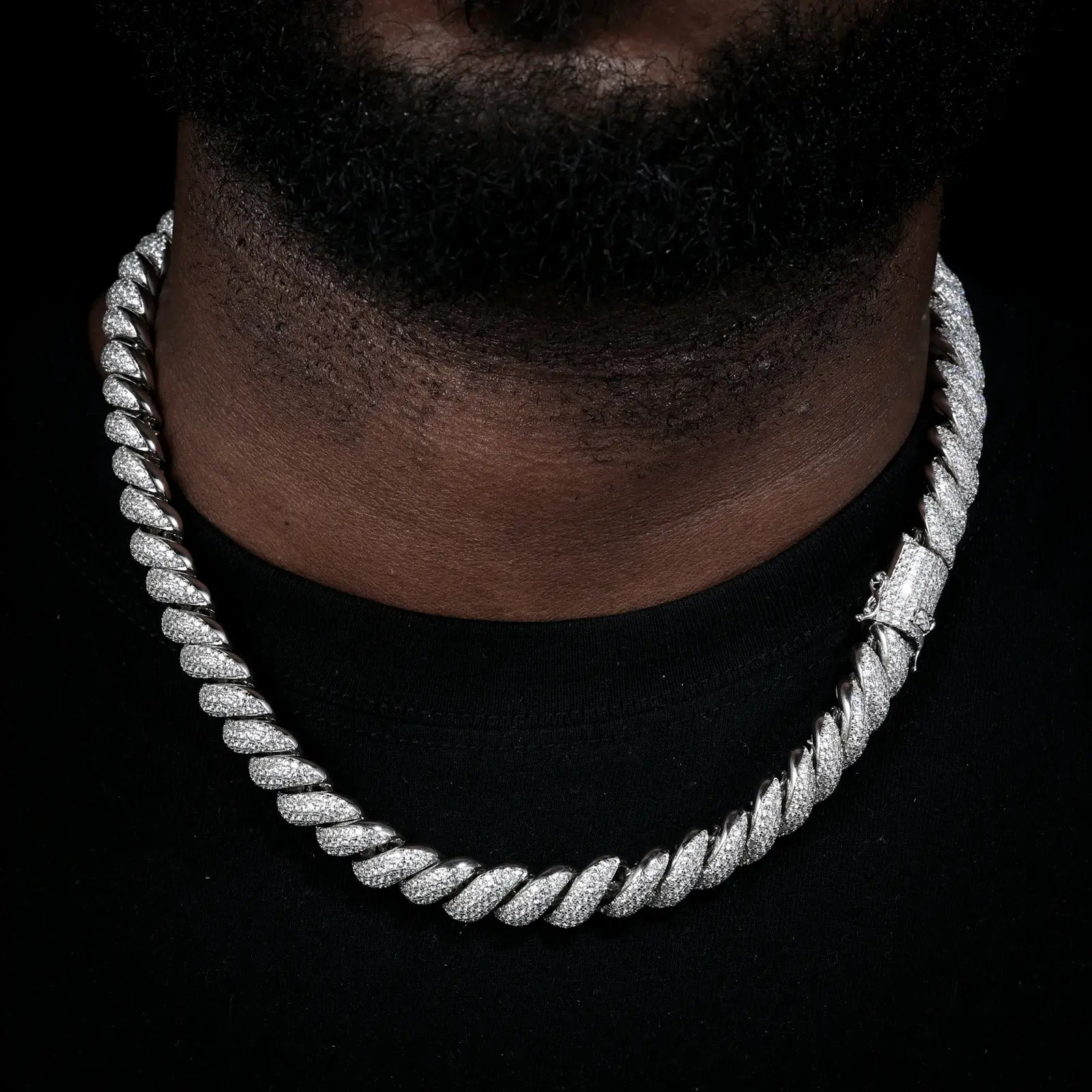 Male model wearing white gold 12mm 925 sterling silver moissanite hemp rope chain — highlights full moissanite sparkle, bold streetwear style, tarnish-resistant 925 silver