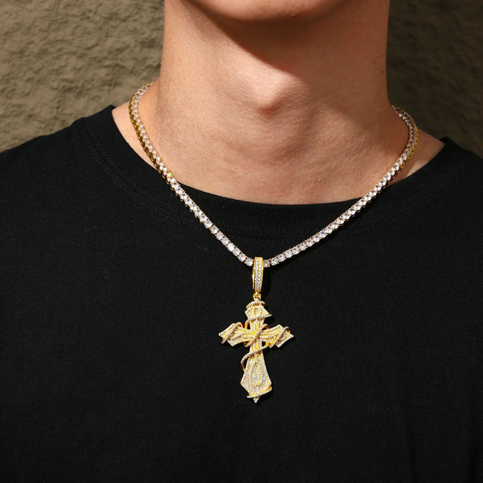 Male model wearing yellow gold 925 sterling silver moissanite thorns cross pendant with tennis chain — hypoallergenic 925 silver, diamond-like moissanite, bold thorns design