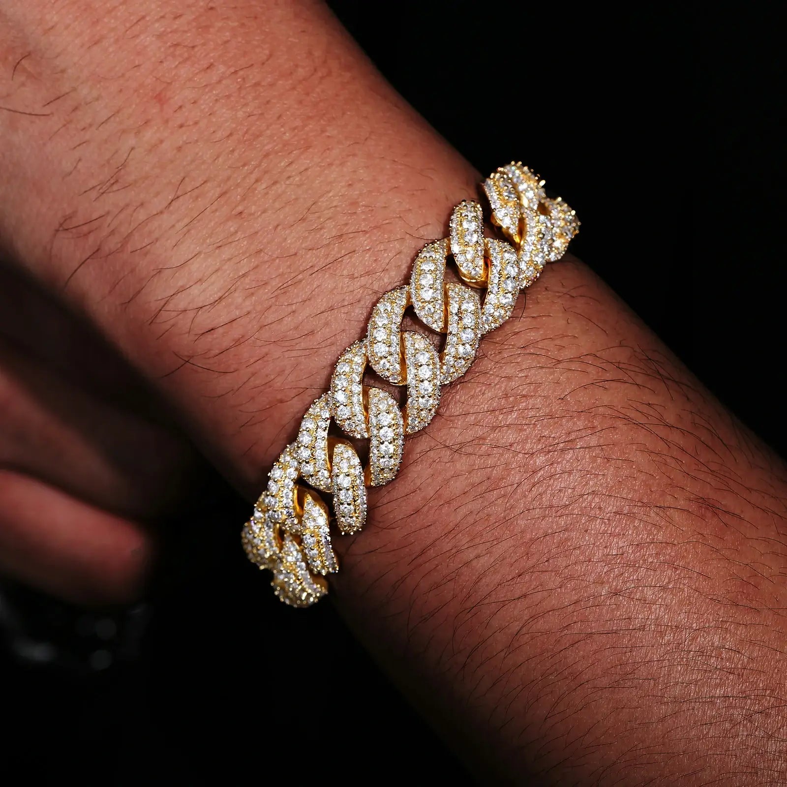 Model wearing gold 15mm 925 sterling silver 3 rows moissanite bubble Cuban link bracelet — showcases everyday wearability, iced-luxury trend, moissanite sparkle, hypoallergenic 925 silver