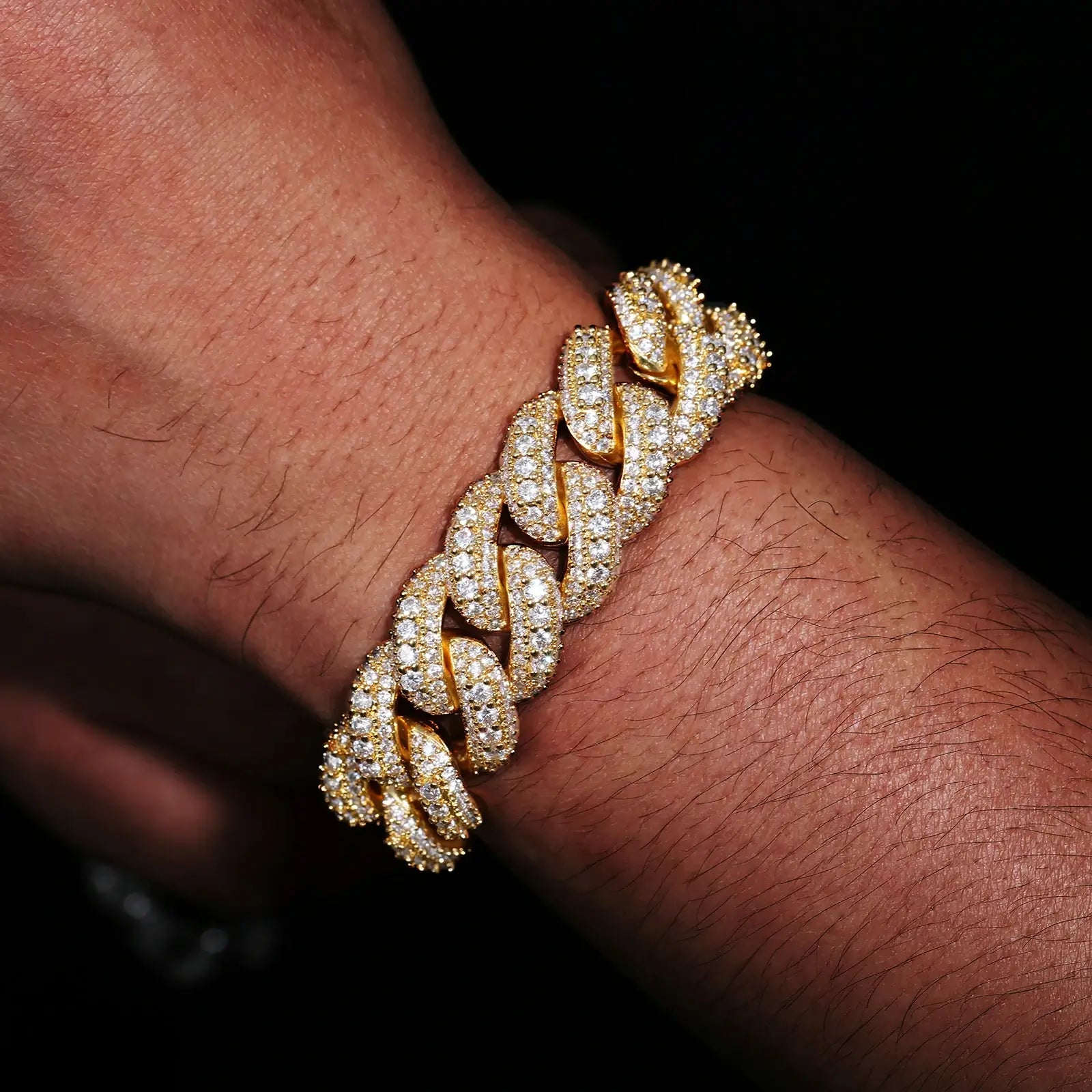 Model wearing gold 18mm 925 sterling silver 3 rows moissanite bubble Cuban link bracelet — showcases streetwear luxury, moissanite sparkle, hypoallergenic 925 silver, everyday wearability