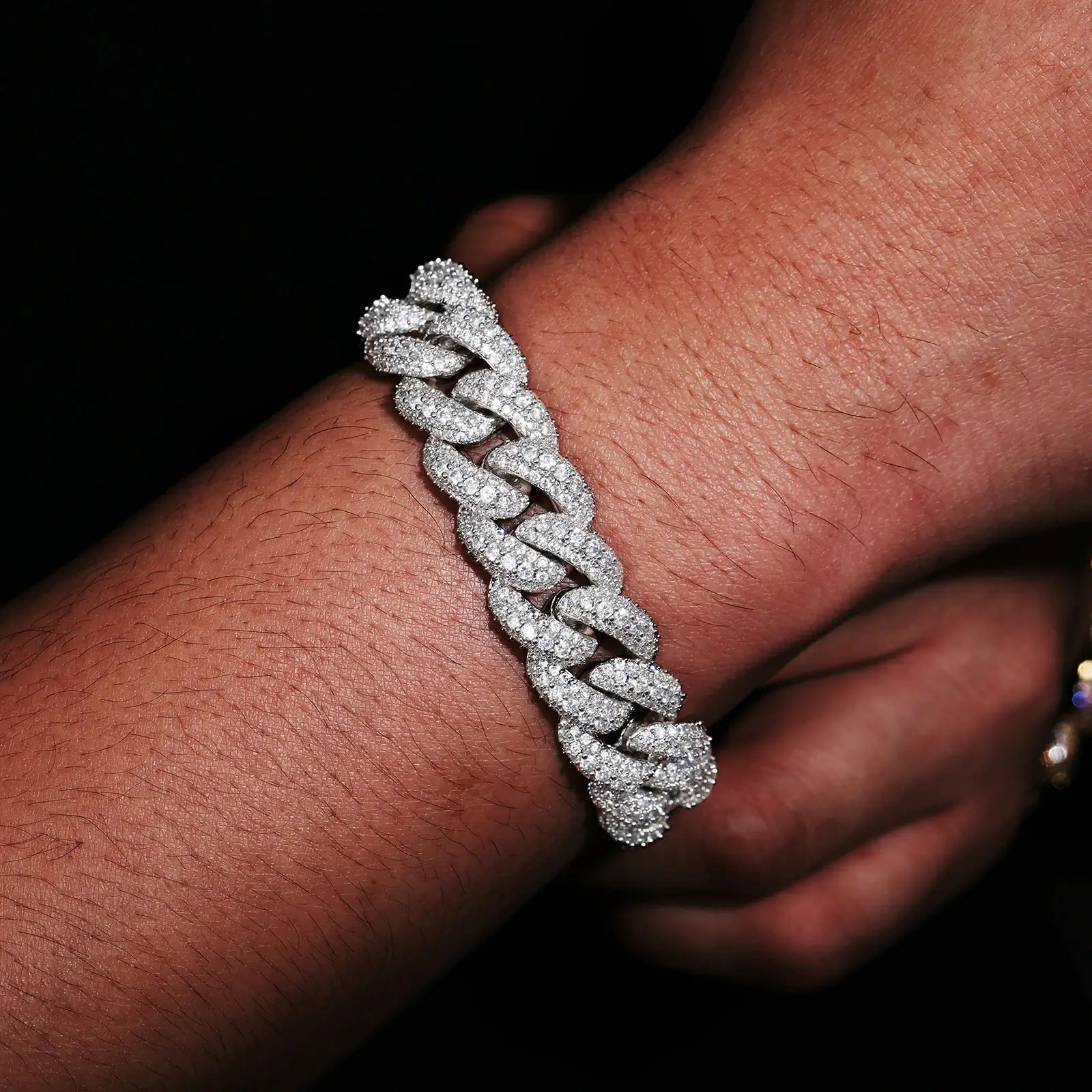 Model wearing silver 15mm 925 sterling silver 3 rows moissanite bubble Cuban link bracelet — highlights classic silver finish, diamond-like moissanite, 925 silver durability, Cuban link trend