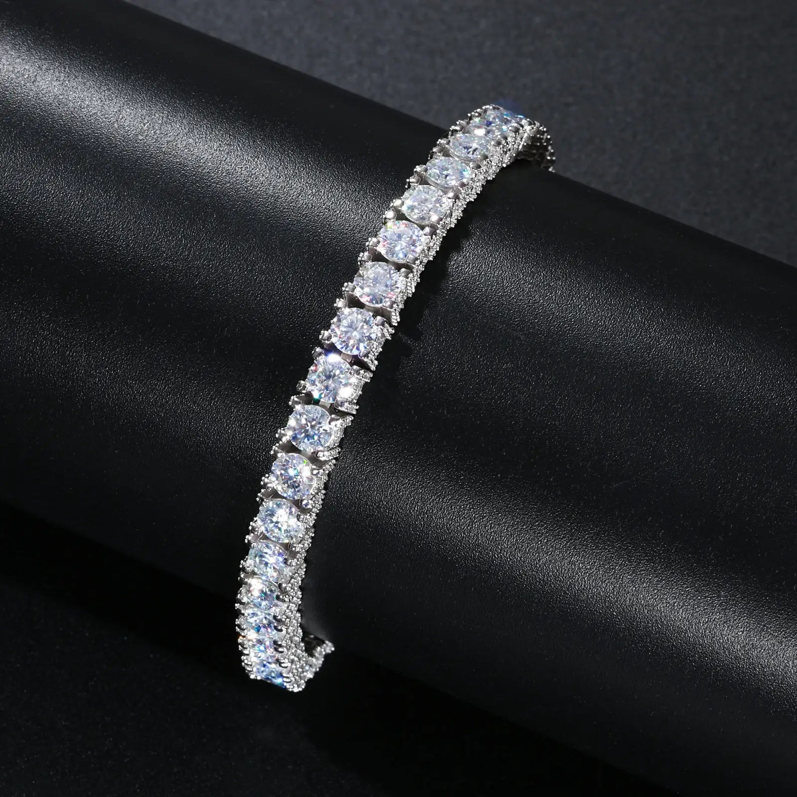 White gold 5mm 925 sterling silver moissanite full iced tennis bracelet wrapped display — highlights full-circle moissanite inlay, 925 silver structure, iced-luxury aesthetic