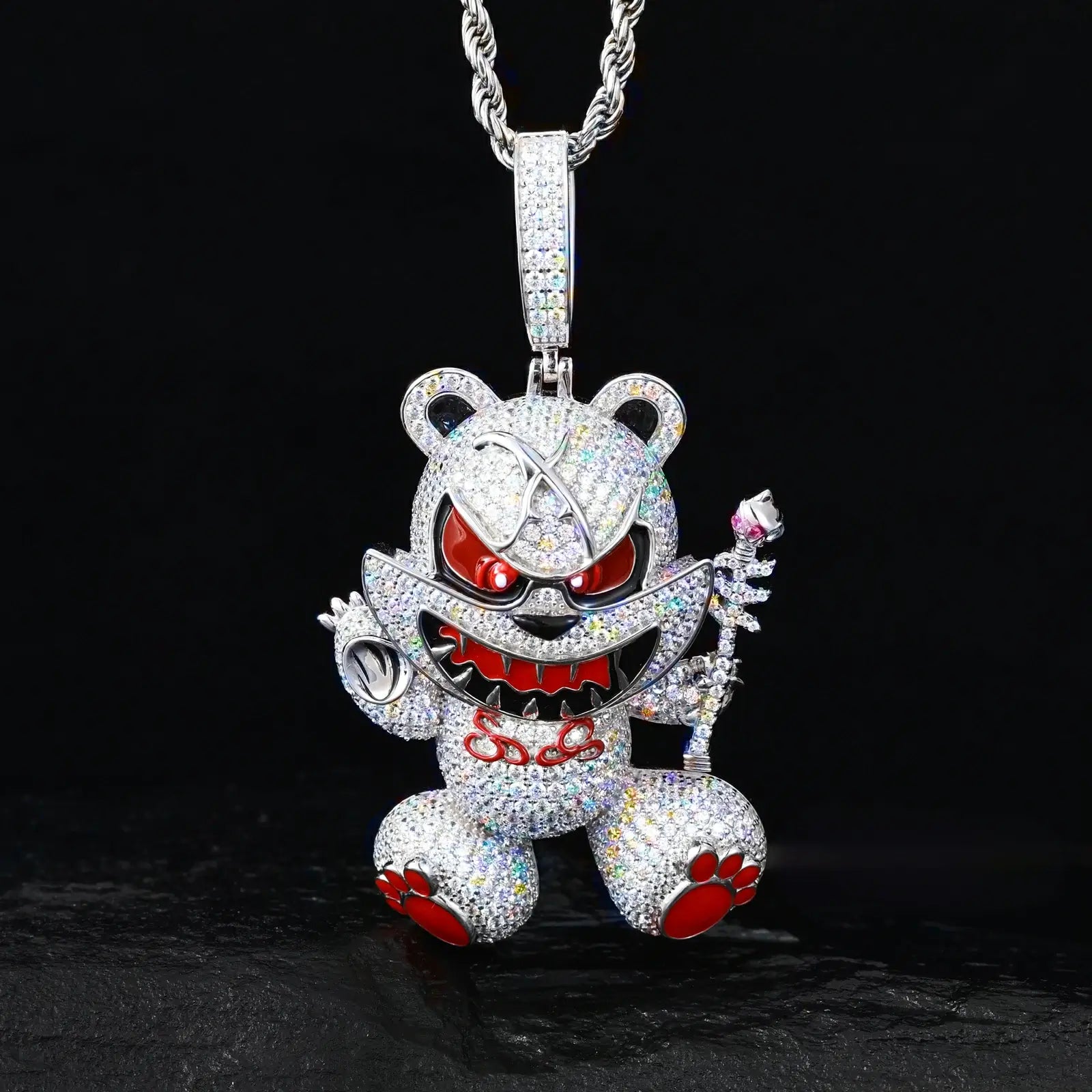 White gold 925 sterling silver moissanite evil bear pendant hanging on black table — showcasing menacing bear, scepter & ruby accents