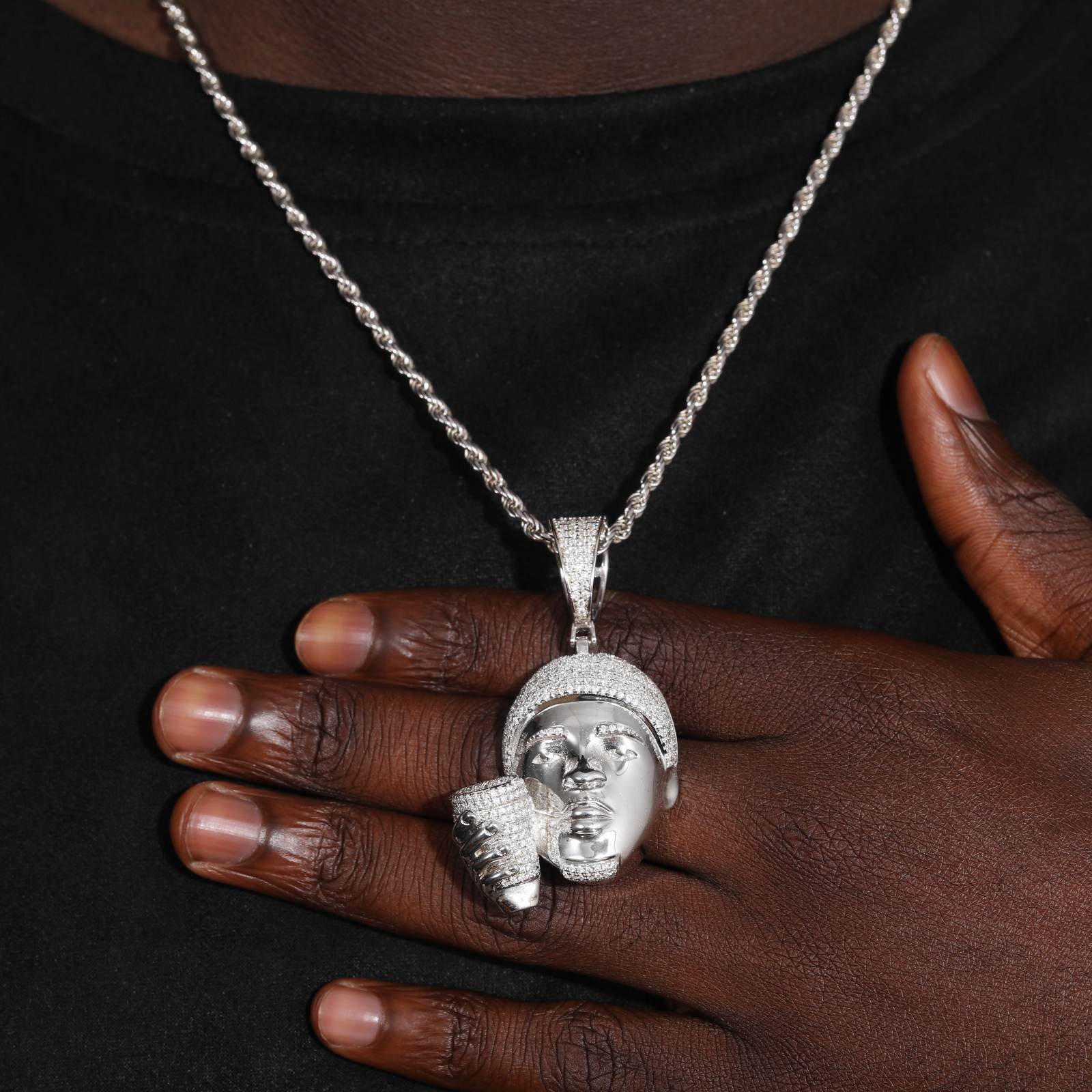 Contemporary male mannequin showcasing rhodium-plated pendant and chain - Timeless sterling silver hip-hop jewelry