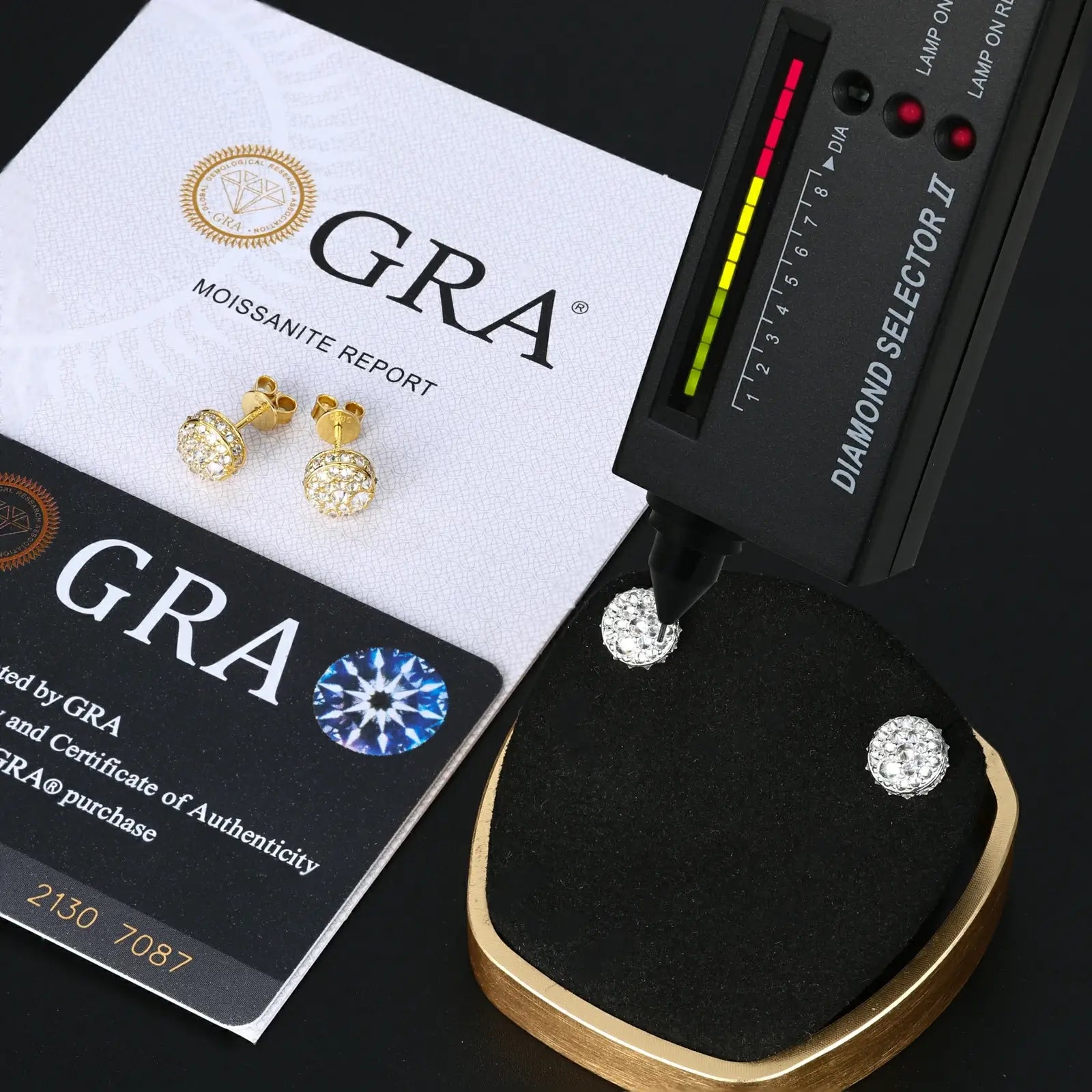 White & yellow gold 925 sterling silver moissanite thorns stud earrings with diamond tester + GRA certificate on black table — certified moissanite, 925 silver durability, edgy thorn design