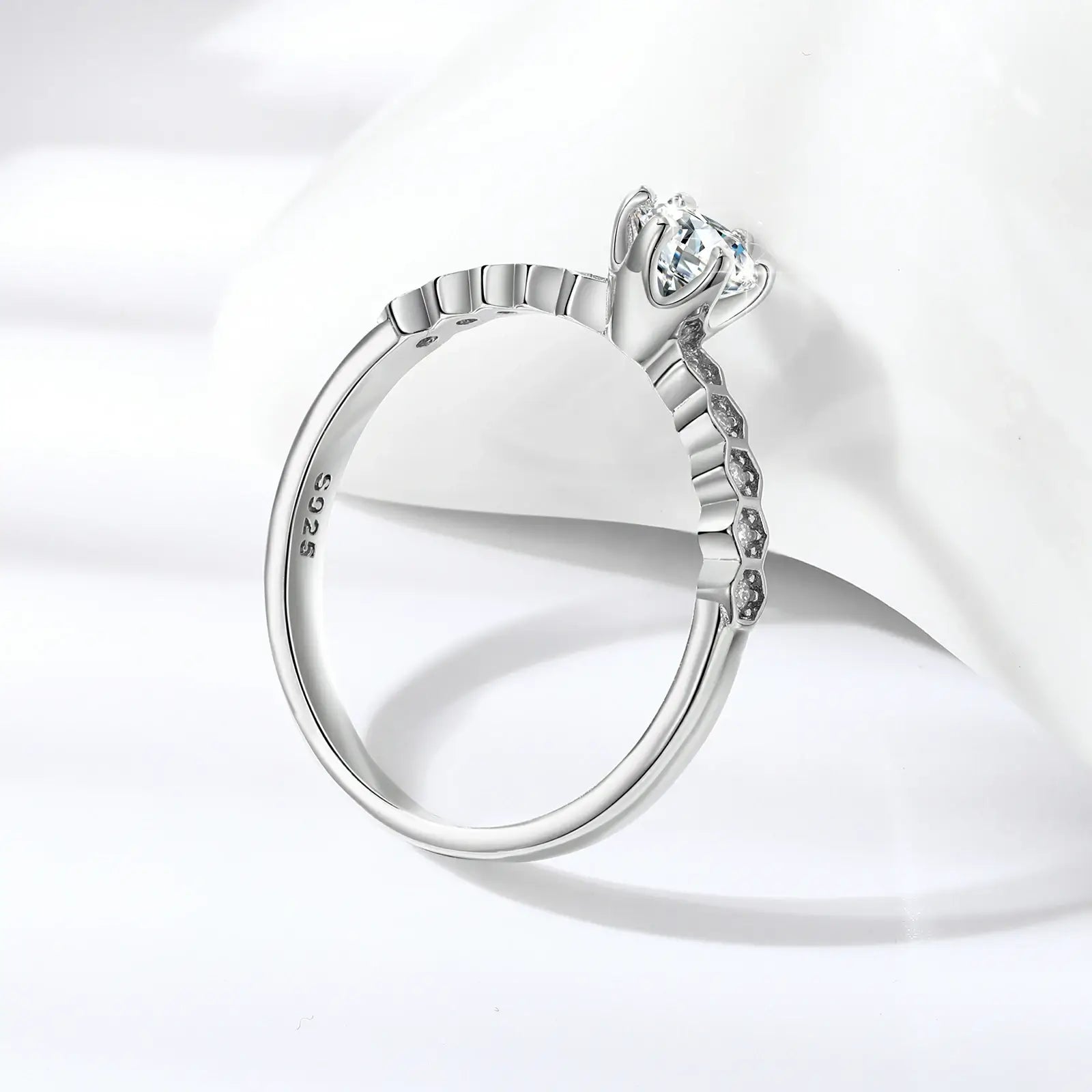 Side view of white gold S925 moissanite eternal nine stars ring — nine-star band detail, S925 silver craftsmanship, eternal design