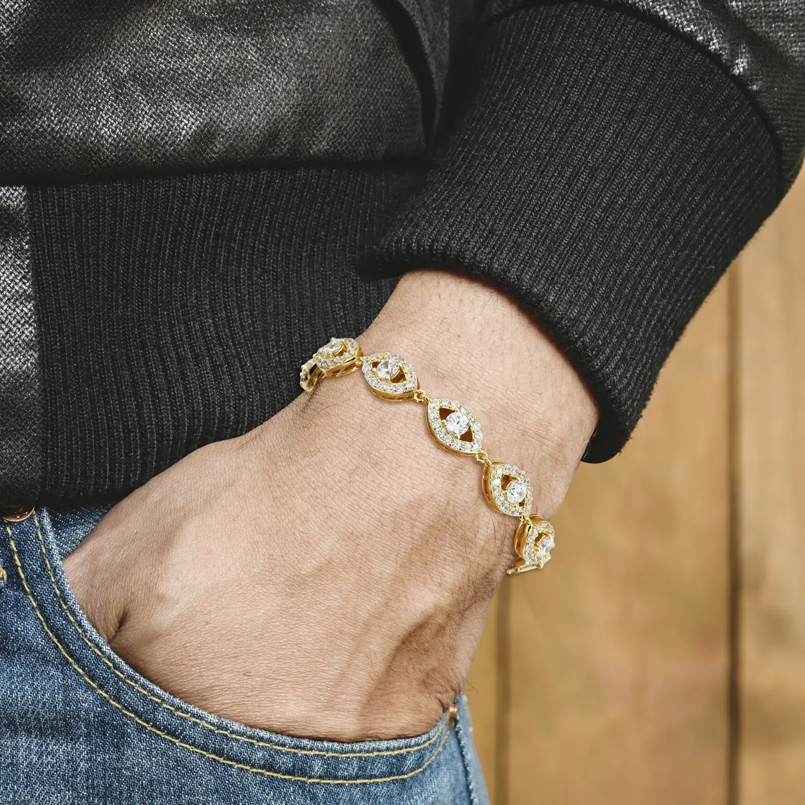 Caucasian male styling 14K yellow gold evil eye bracelet with white moissanite center - hypoallergenic S925 core for sensitive skin | Boardroom mysticism