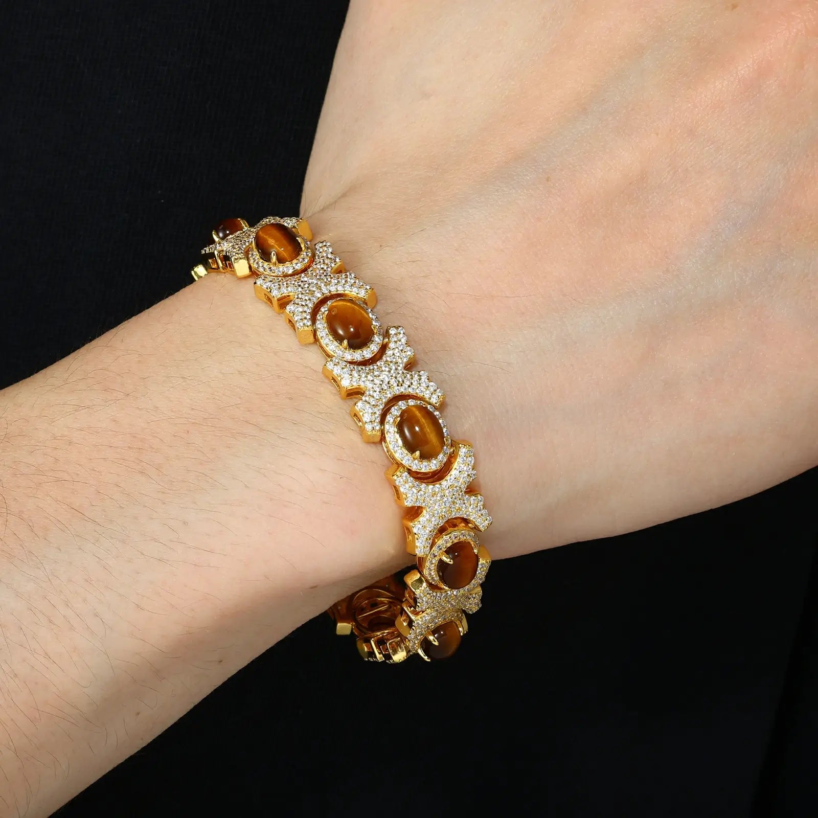 Gold plated X-link bracelet stacked with watch - obsidian stones contrasting fair skin | Hypoallergenic S925 security