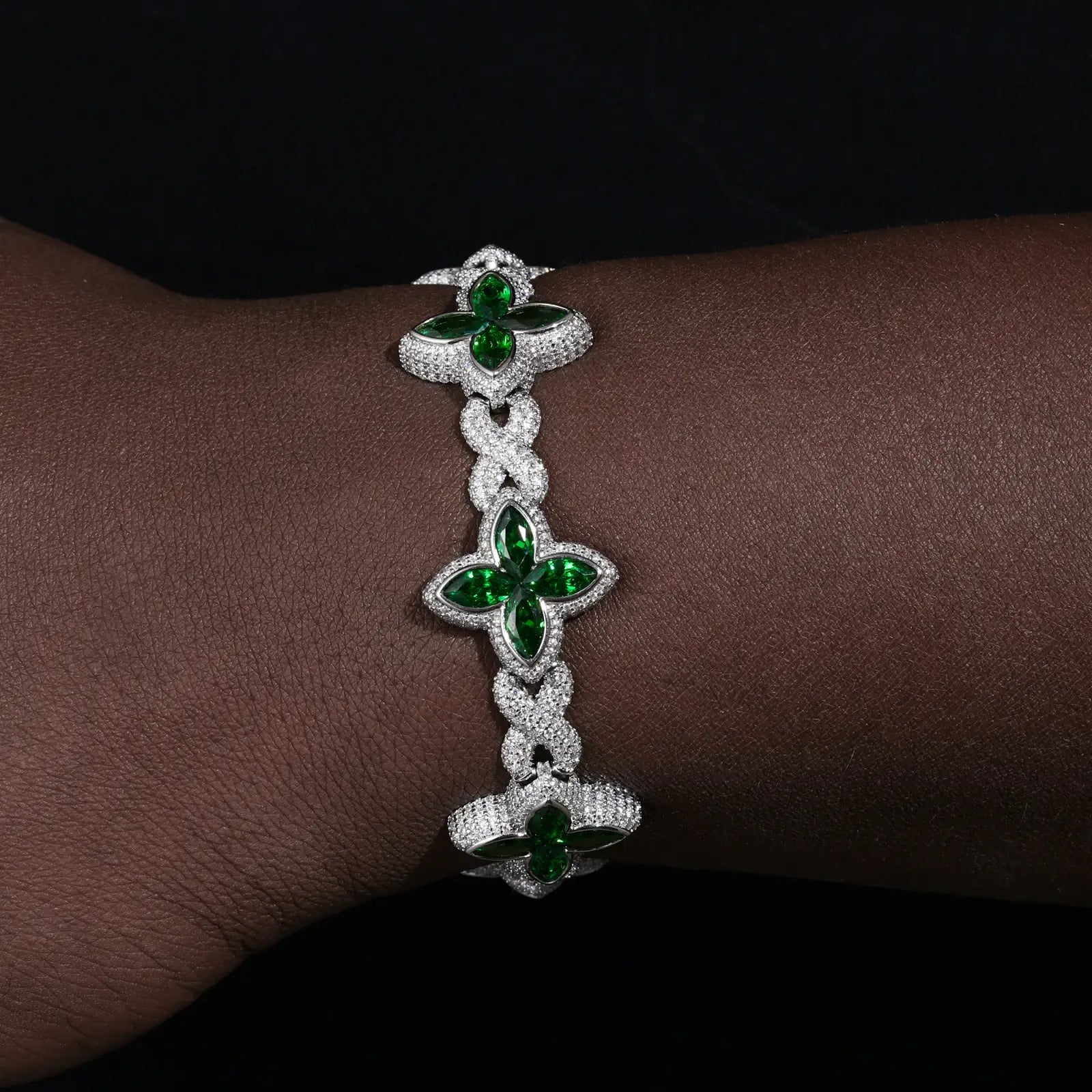 Caucasian male modeling green four-leaf clover bracelet - 21mm S925 moissanite infinity chain | Waterproof prosperity symbol
