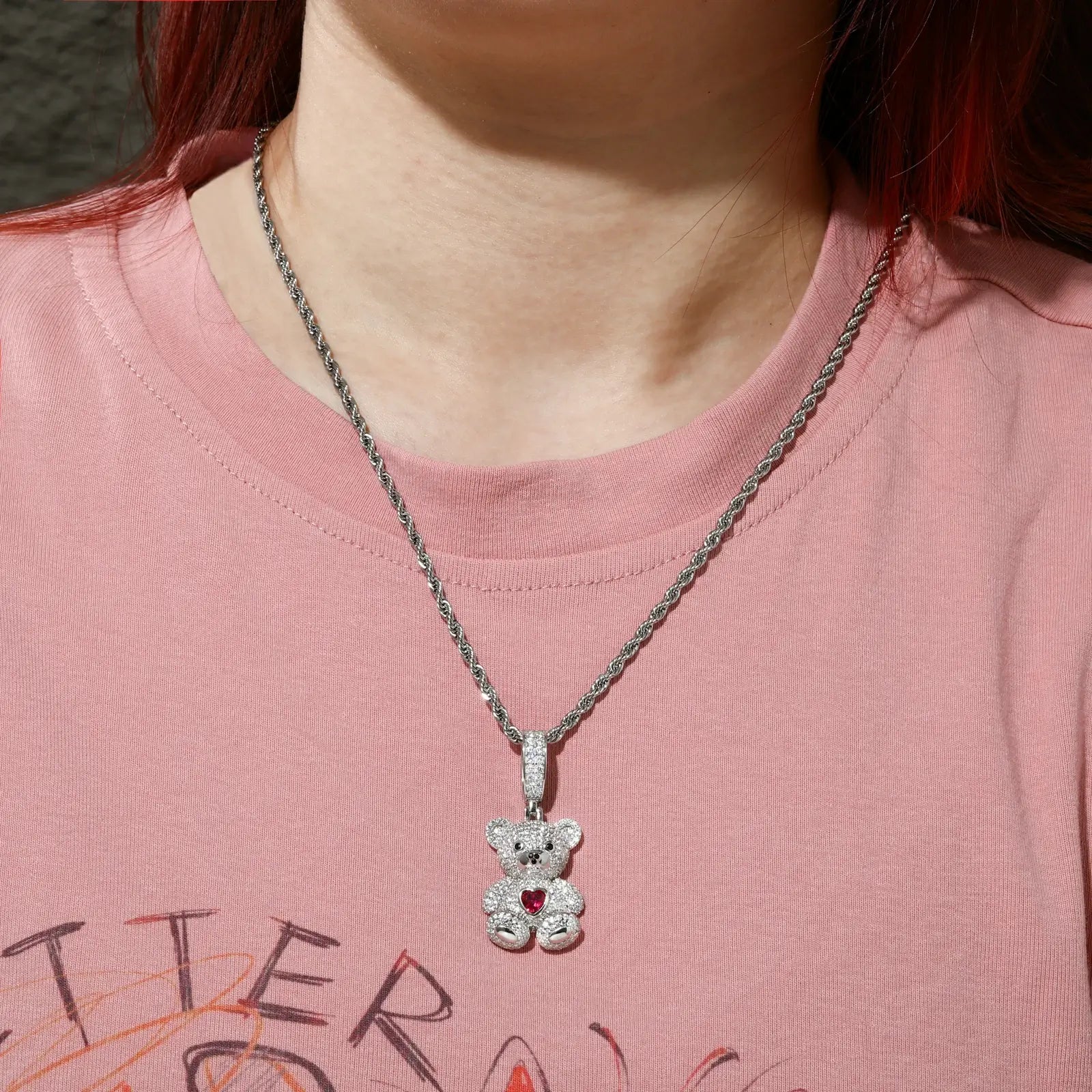Female model wearing white gold sweetheart bear pendant on twisted chain - elegant S925 sterling silver moissanite necklace