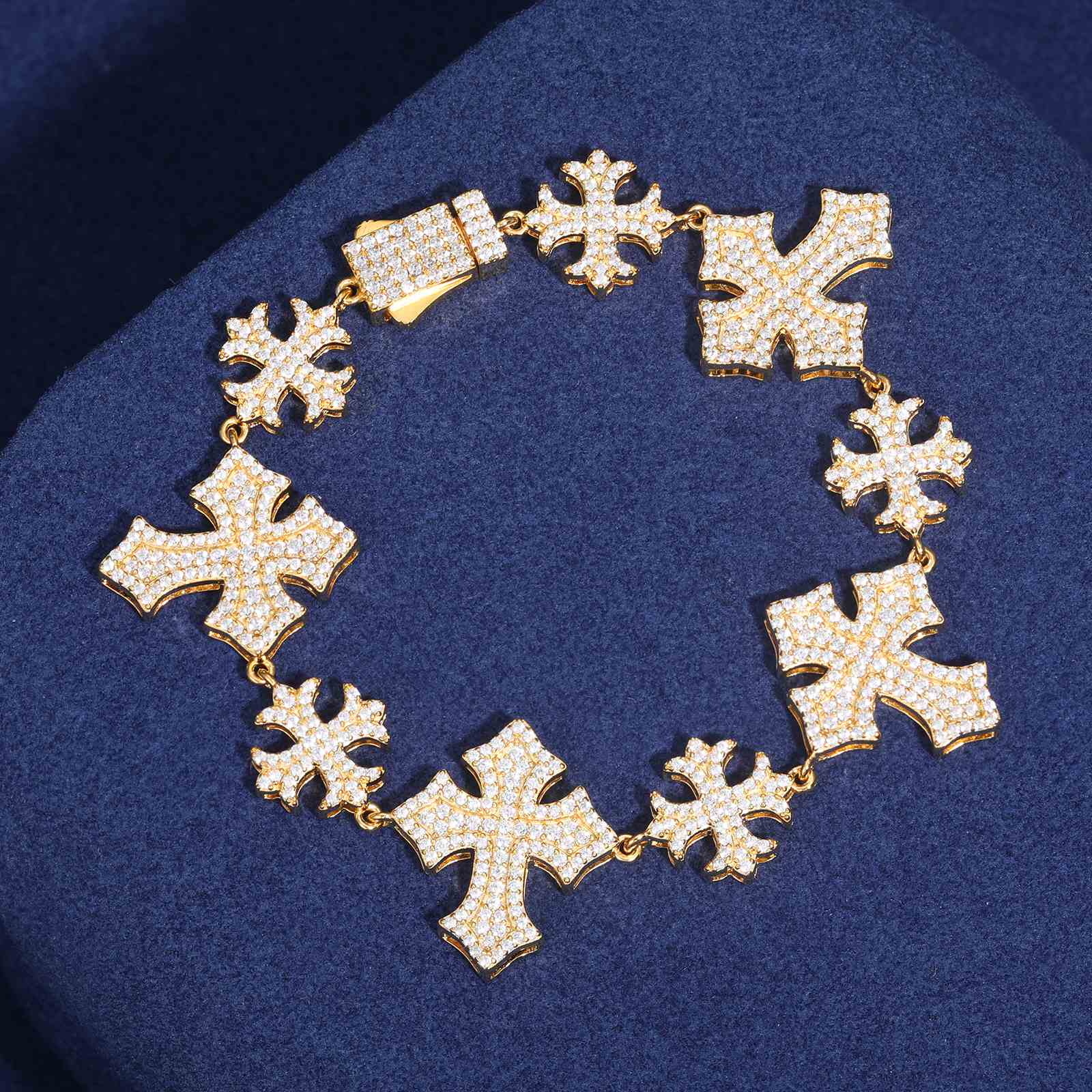 22mm gold S925 Moissanite cross bracelet on dark blue velvet, emphasizing 3.5ct diamond-like sparkle and Cuban link chain for luxury gifting or hypebeast collections.