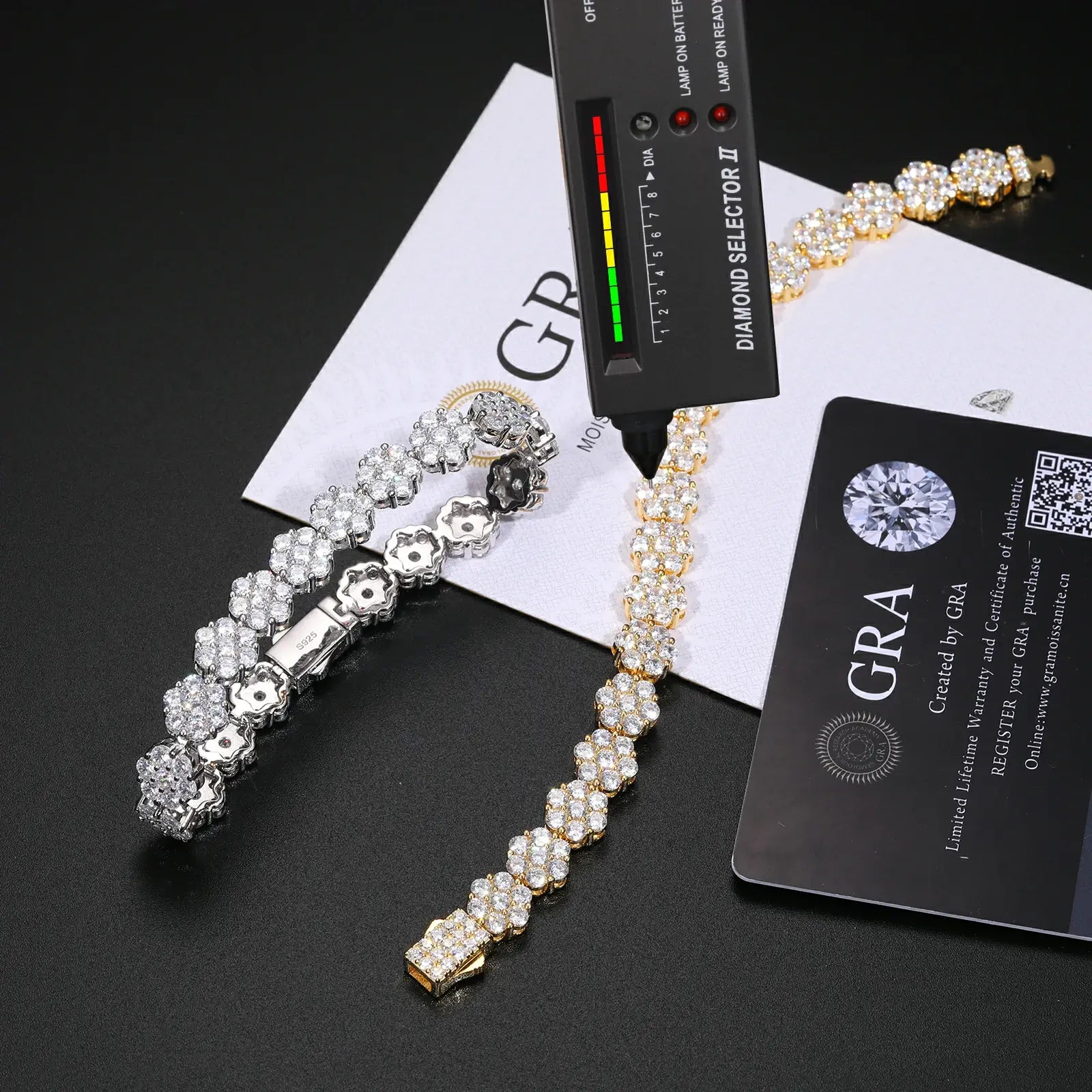 Authenticity verification: GRA certificate + diamond tester showing 9mm bracelet's moissanite RI 2.65 > diamond 2.42 | S925 hallmark visible during test