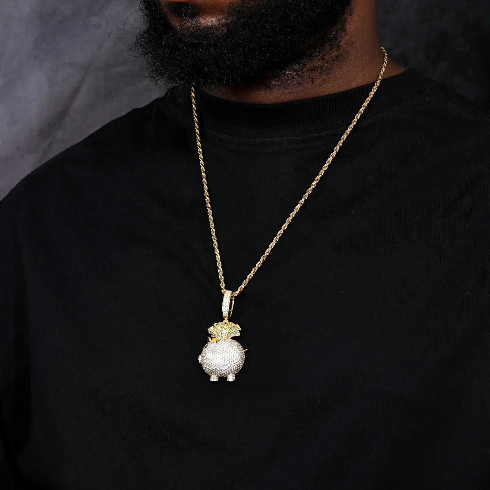 Male model styling gold-tone piggy bank pendant - cash fan design on twisted chain | Tarnish-proof S925 silver core