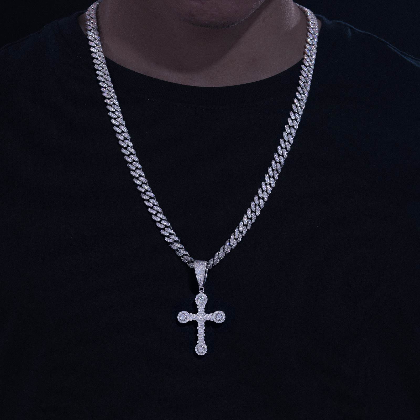 African American man styling S925 moissanite cross pendant on Cuban chain - hypoallergenic silver for sensitive skin | Street sanctity statement