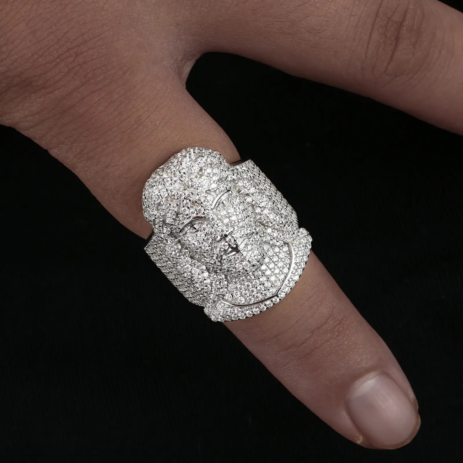 Caucasian man wearing micro-pavé Jesus ring on pinky - S925 silver with moissanite halo | Men's luxury religious jewelry
