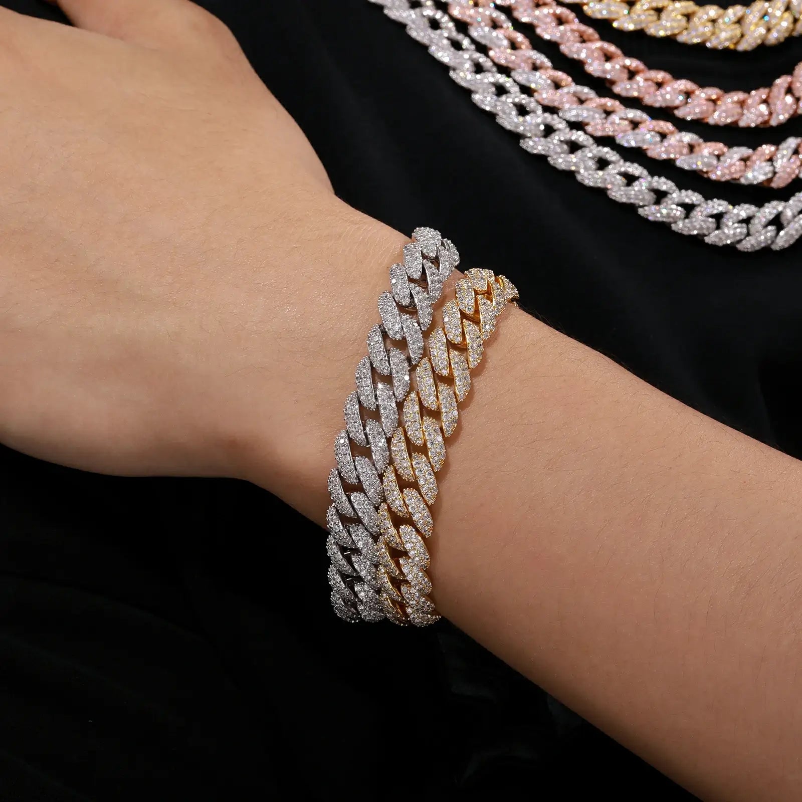 Style influencer wearing both white and yellow gold Cuban link bracelets with CZ stones, demonstrating versatile luxury jewelry options.