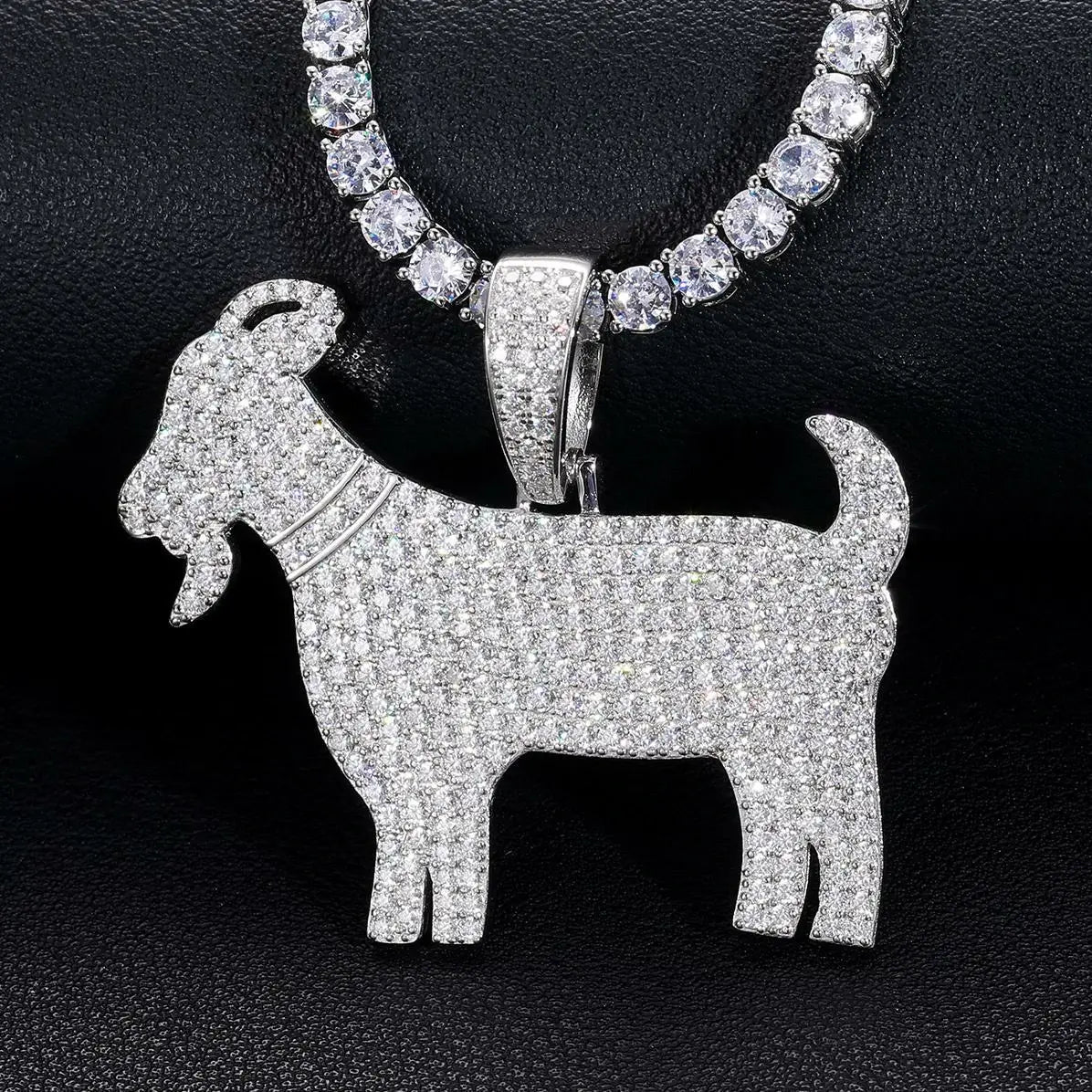 S925 goat pendant with tennis chain on black table - moissanite pavé horns and diamond-like eyes | Men's luxury spiritual jewelry