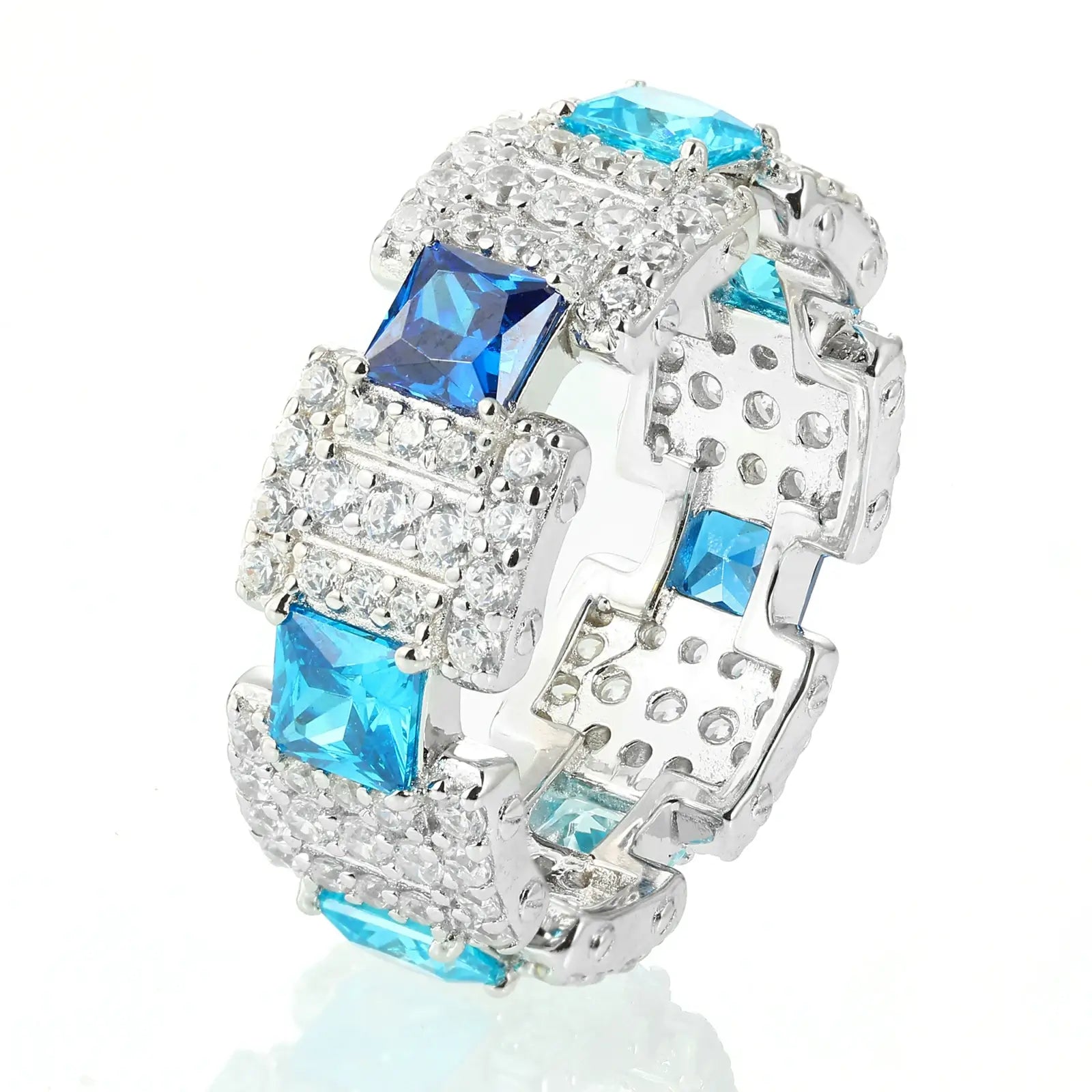 White gold ocean ring isolated - gradient blue moissanites under studio lights | GRA-certified S925 wave jewelry